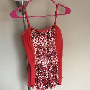 Red top with satin accent